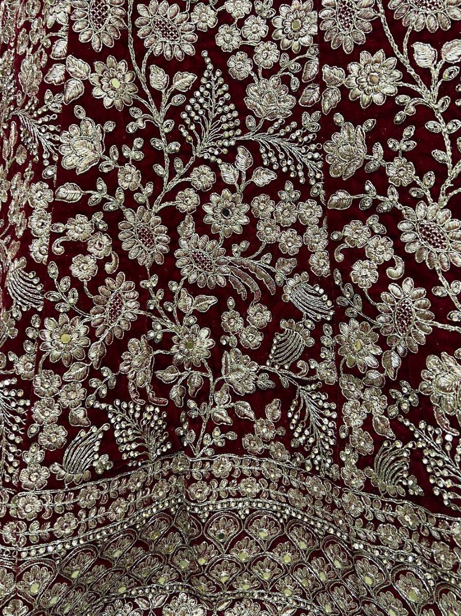 Maroon velvet ethnic wear with silver floral embroidery and beadwork detail