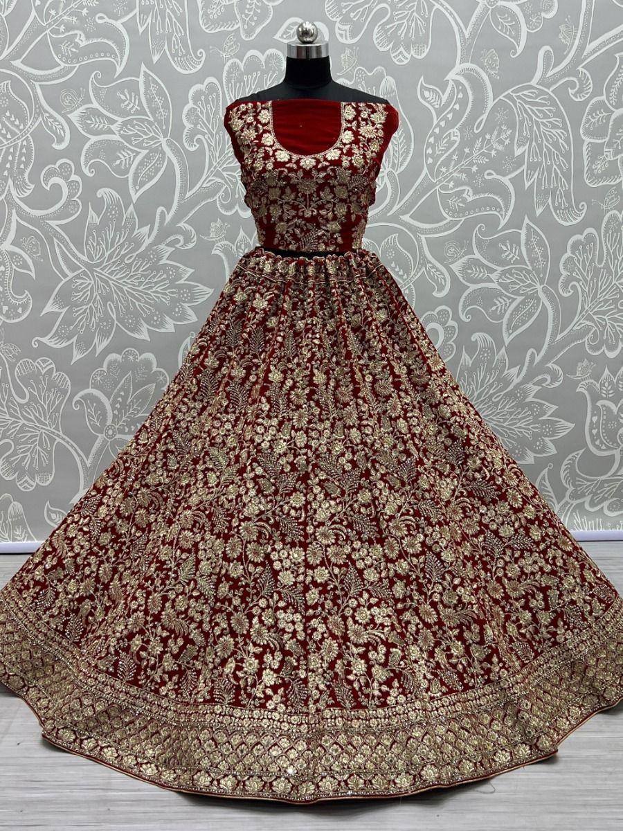 Maroon velvet lehenga choli with gold floral embroidery, designer ethnic wear for weddings