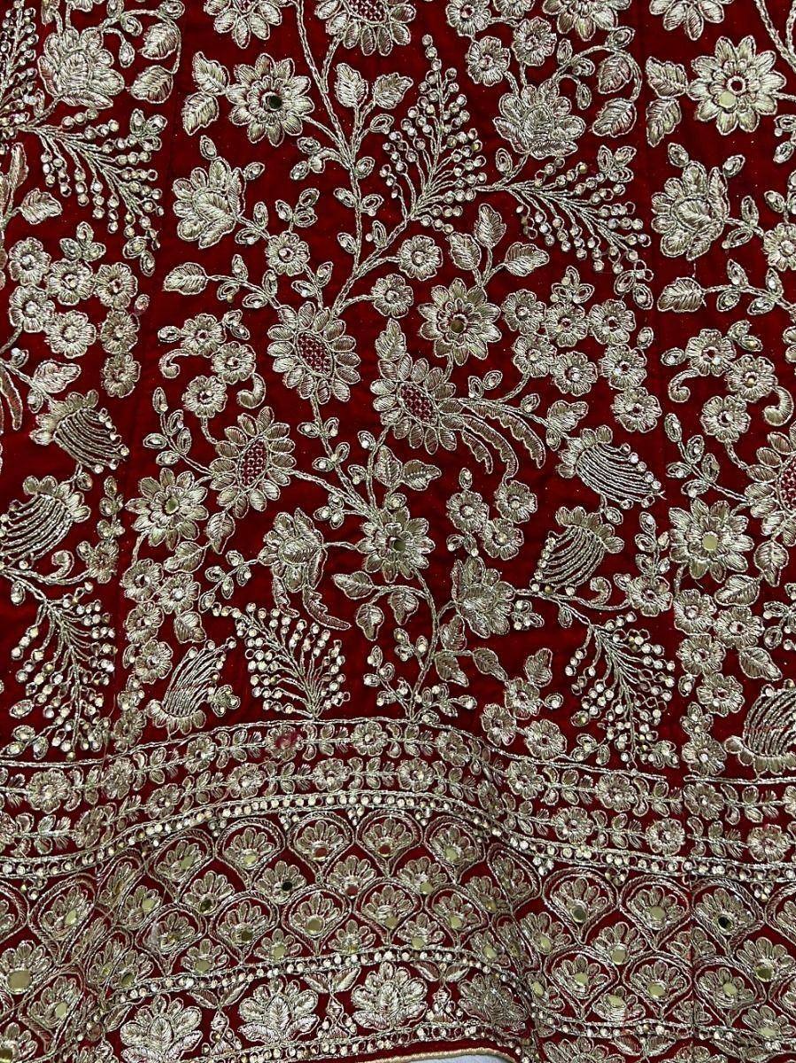 Rich maroon velvet with silver floral embroidery, perfect for Indian ethnic wear like lehenga choli or saree.