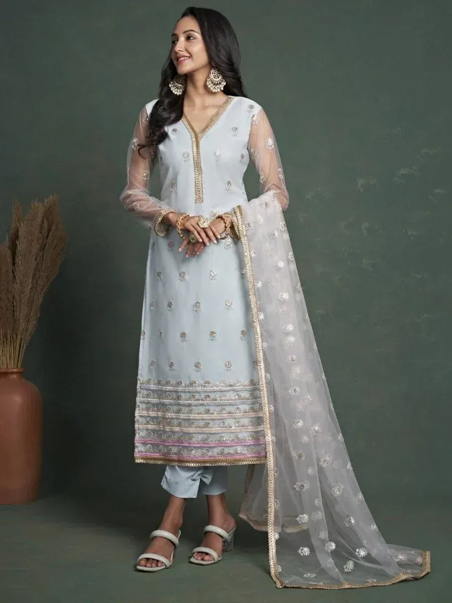 Light blue embroidered salwar kameez with sheer dupatta, gold detailing, and matching pants for ethnic wear