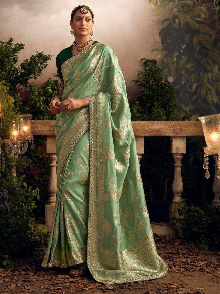 Elegant mint green saree with gold floral embroidery, perfect for Indian ethnic occasions