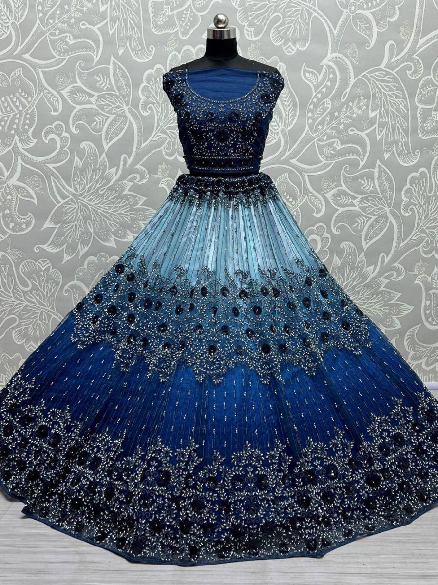 Blue ombre lehenga choli with heavy embroidery and beadwork, perfect for Indian ethnic wear events