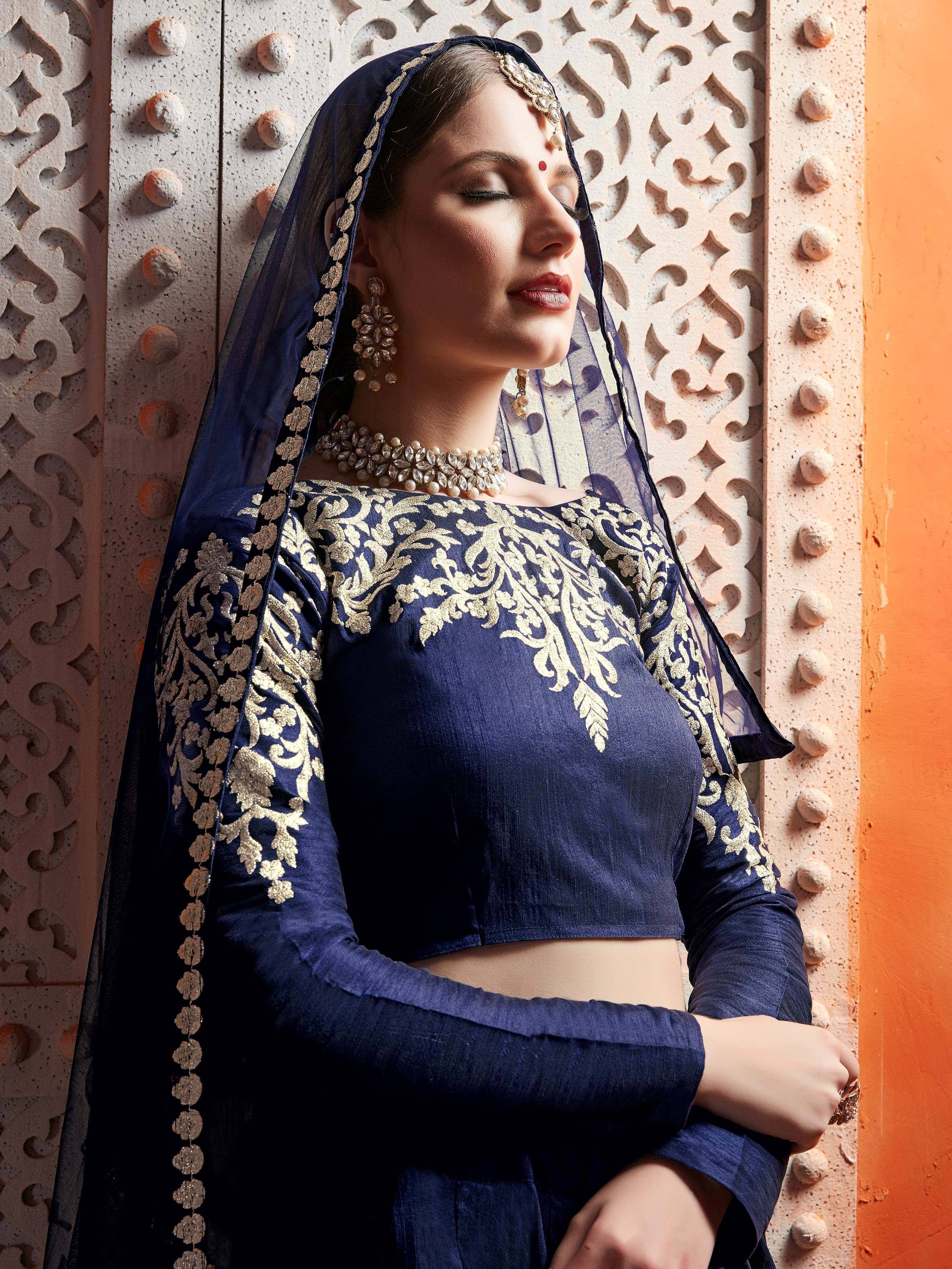Navy blue embroidered lehenga choli with gold work and dupatta, traditional Indian ethnic wear
