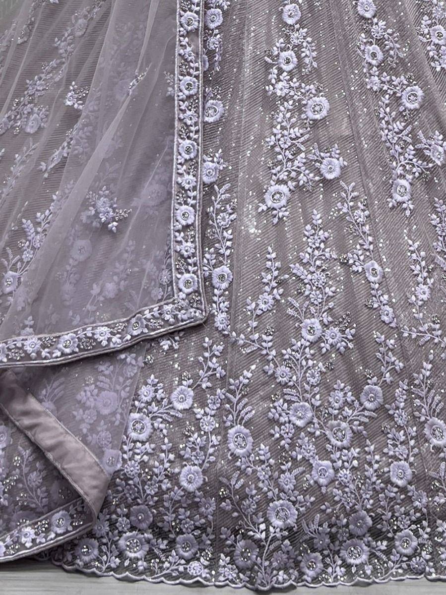 Lavender floral embroidered lehenga with sheer dupatta, perfect for Indian ethnic wear occasions.