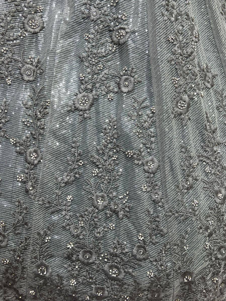 Grey embroidered ethnic gown with floral sequin detailing, perfect for Indian weddings and parties.