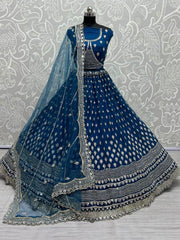 Stunning Blue Zircon Heavy Embroidered Net Lehenga Choli