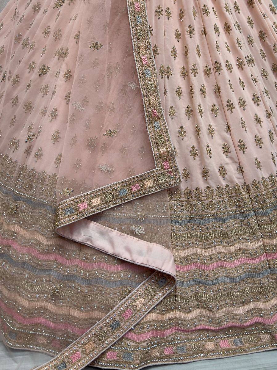 Pink designer lehenga choli with gold embroidery and sequin detailing, ethnic wear for women