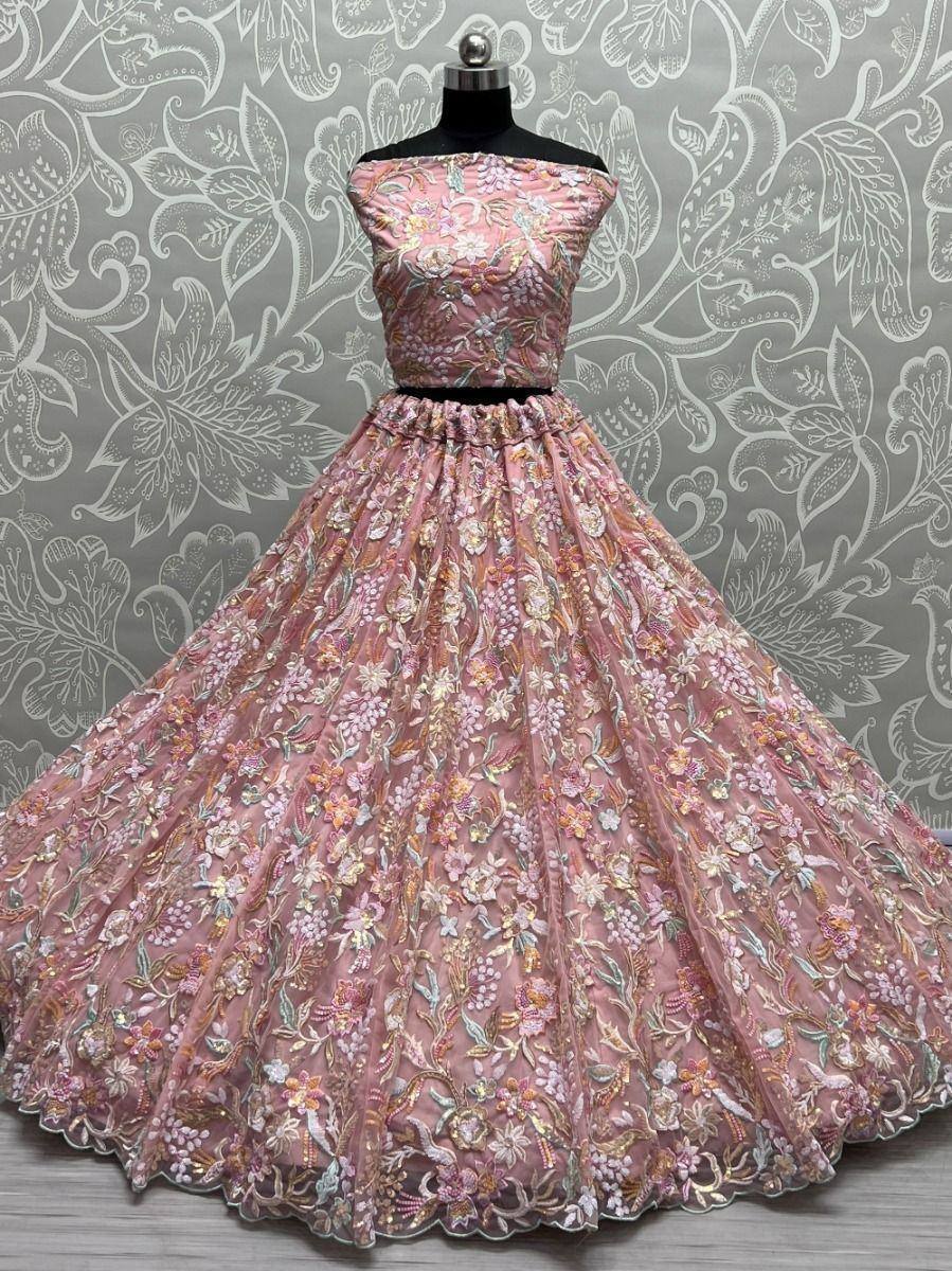 Pink floral embroidered lehenga choli with off-shoulder top, perfect for weddings and festive occasions