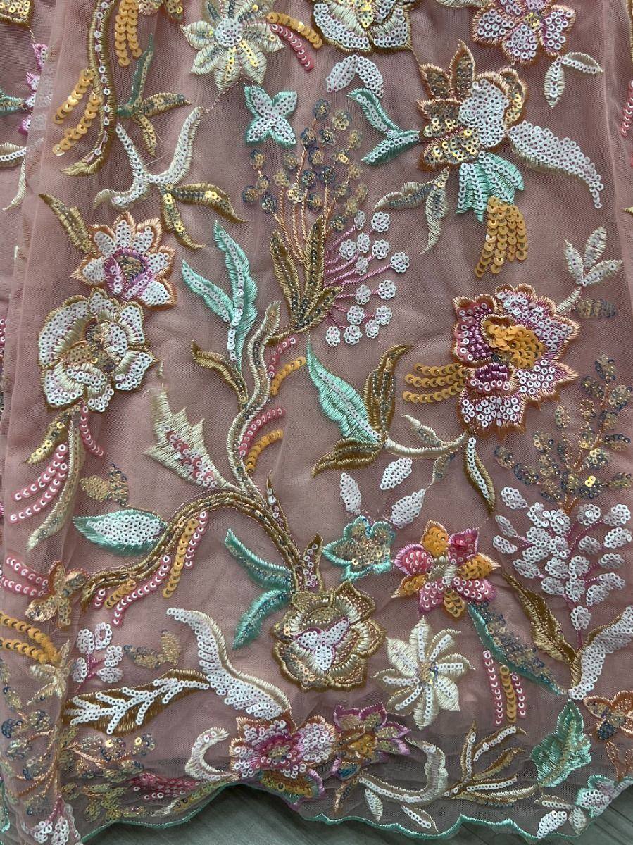 Floral embroidered ethnic wear fabric with sequins and threadwork in pink, gold, and mint tones
