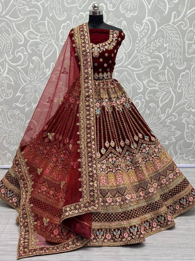 Attractive Maroon Embroidered Wedding Wear Velvet Lehenga Choli
