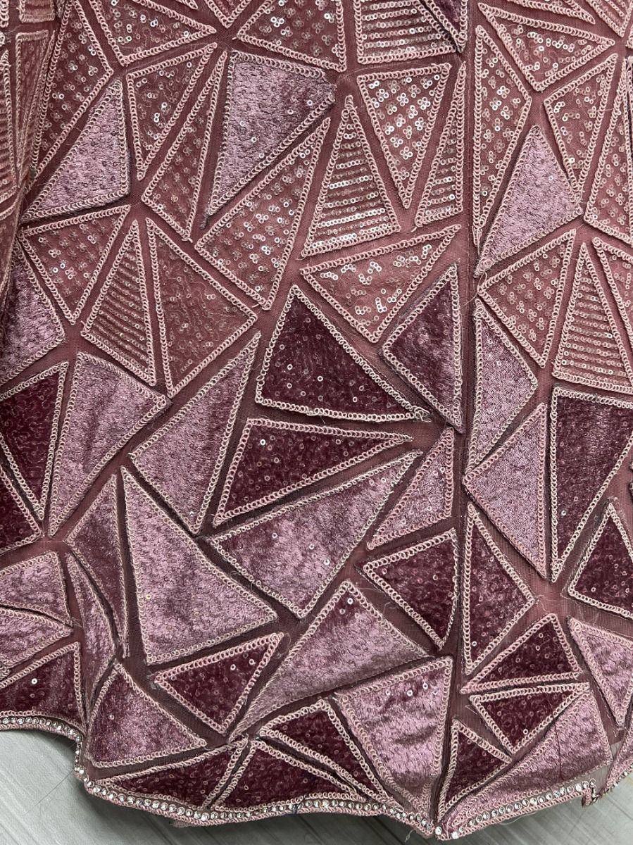 Luxury maroon velvet lehenga with geometric sequin embroidery and scalloped hem detail
