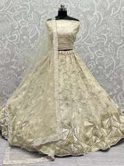 Fascinating Beige Sequins Embroidered Net Lehenga Choli