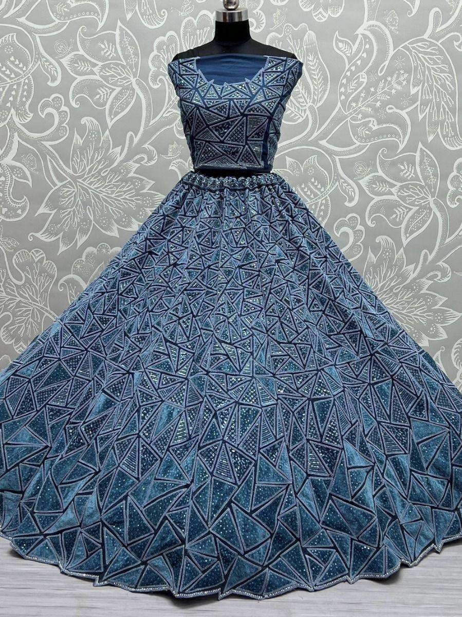 Blue geometric embroidered ethnic gown with flared skirt, perfect for Indian weddings and festive occasions