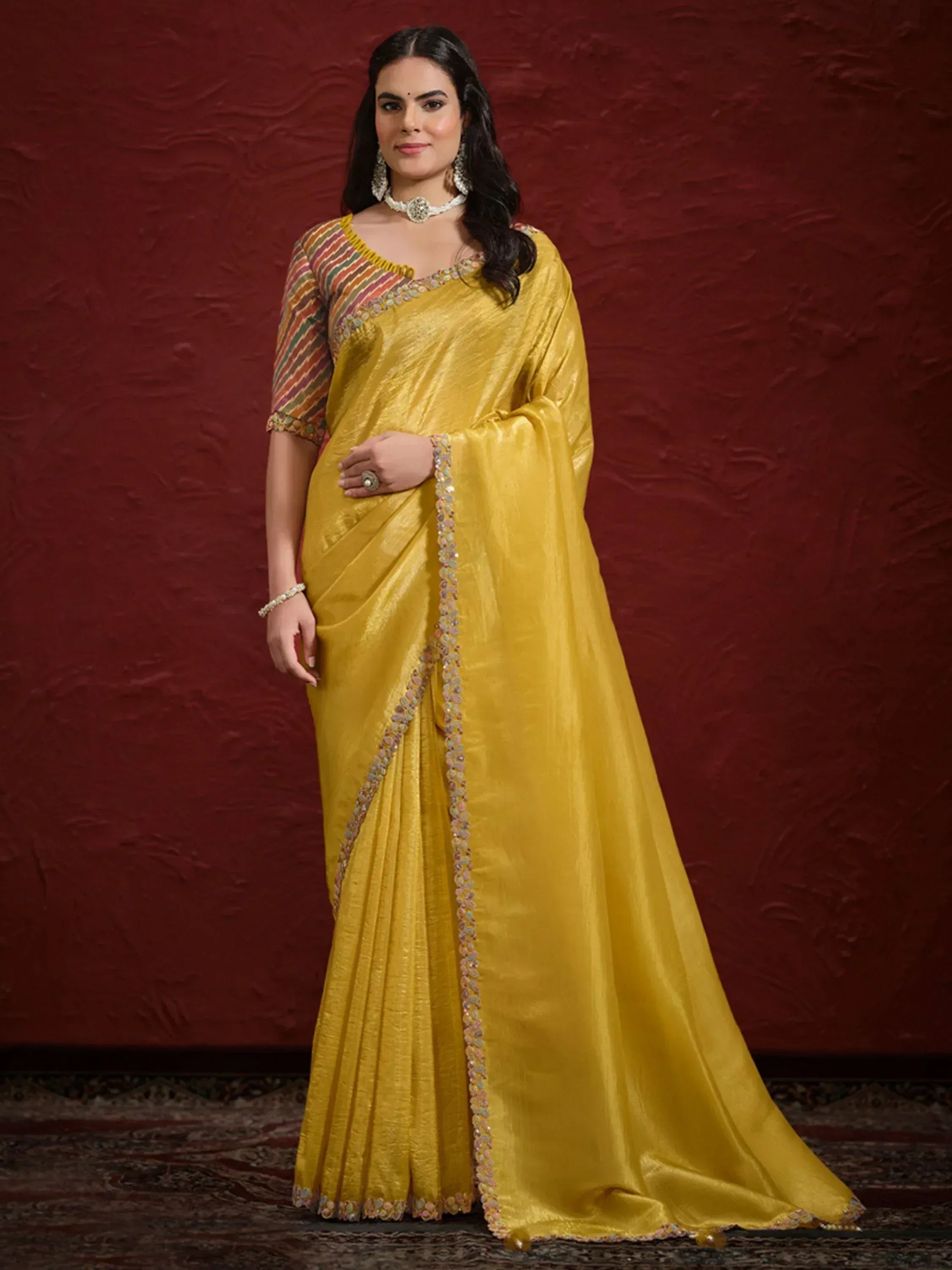 Yellow designer saree with striped blouse and mirror work, Indian ethnic wear for women
