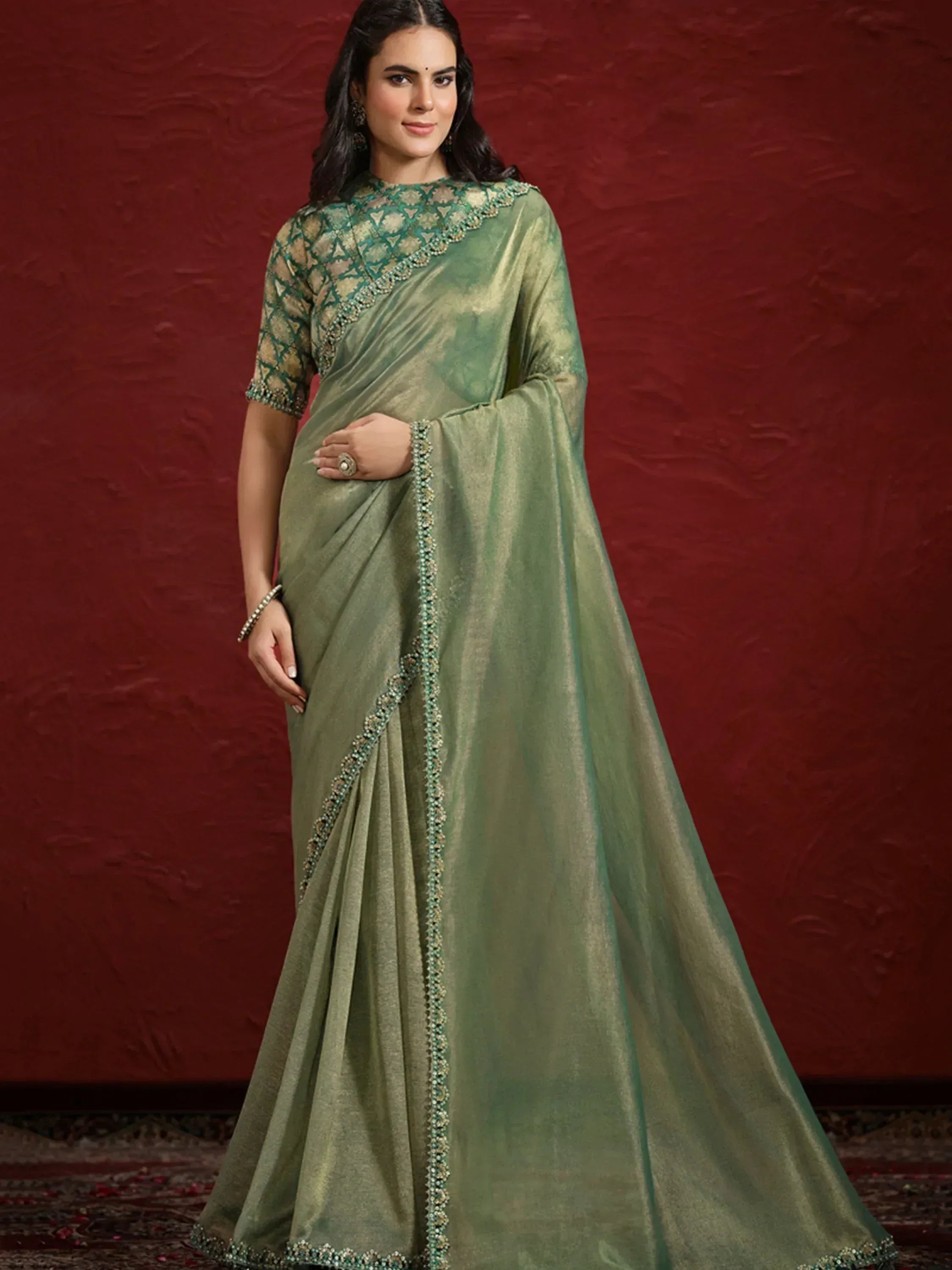 Elegant green saree with embroidered blouse, perfect for Indian ethnic wear occasions