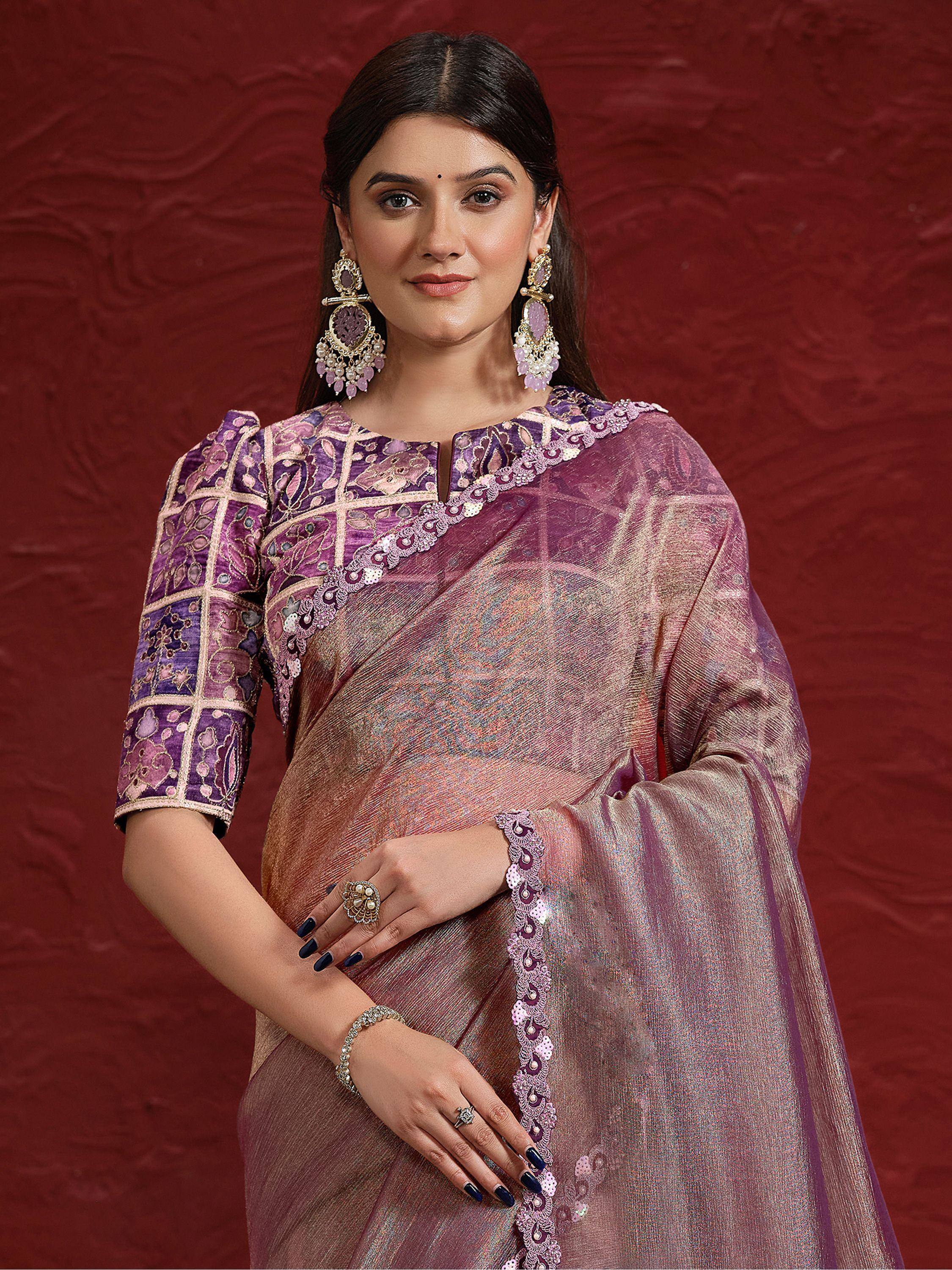 Elegant purple and gold embroidered saree with matching blouse, perfect for Indian ethnic occasions