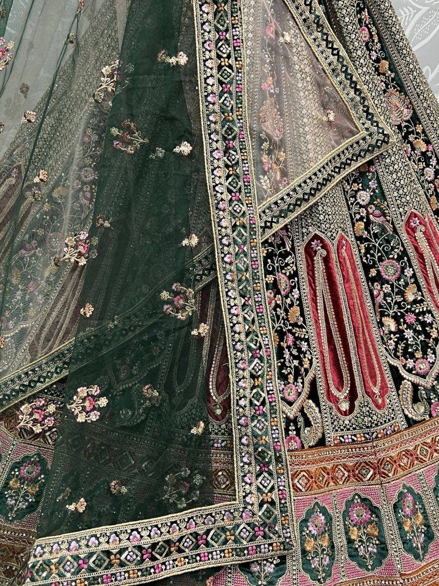 Dark green embroidered lehenga choli with floral zari work and velvet detailing, perfect for Indian ethnic wear.