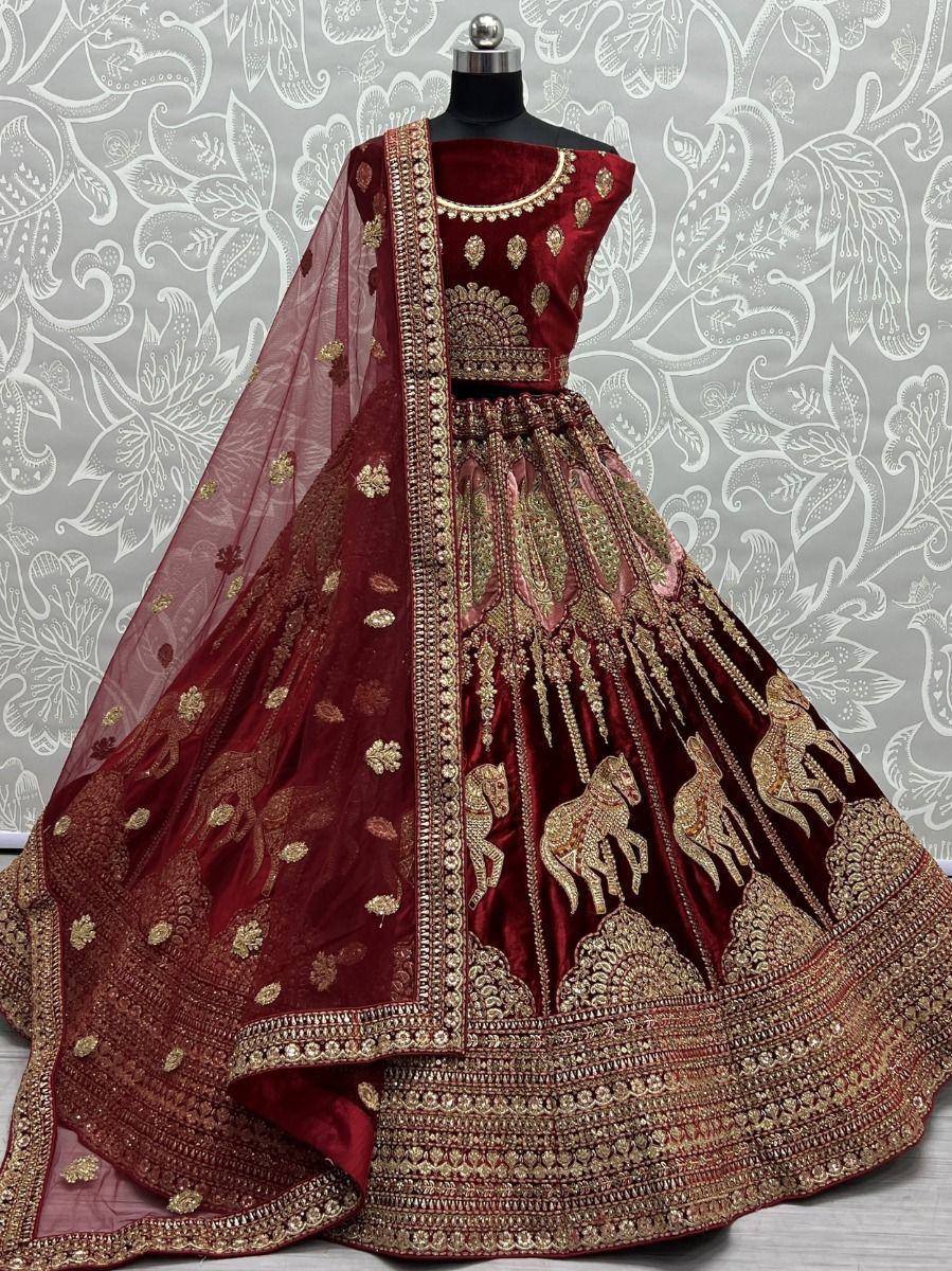 Maroon velvet lehenga choli with gold horse embroidery and sheer dupatta, Indian ethnic wear