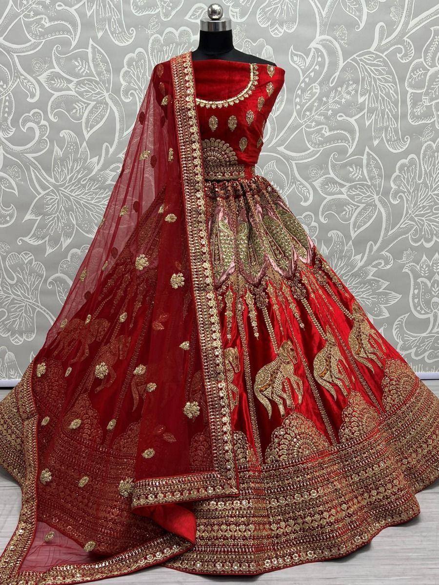 Red velvet lehenga choli with gold elephant embroidery and sheer dupatta, Indian ethnic wear