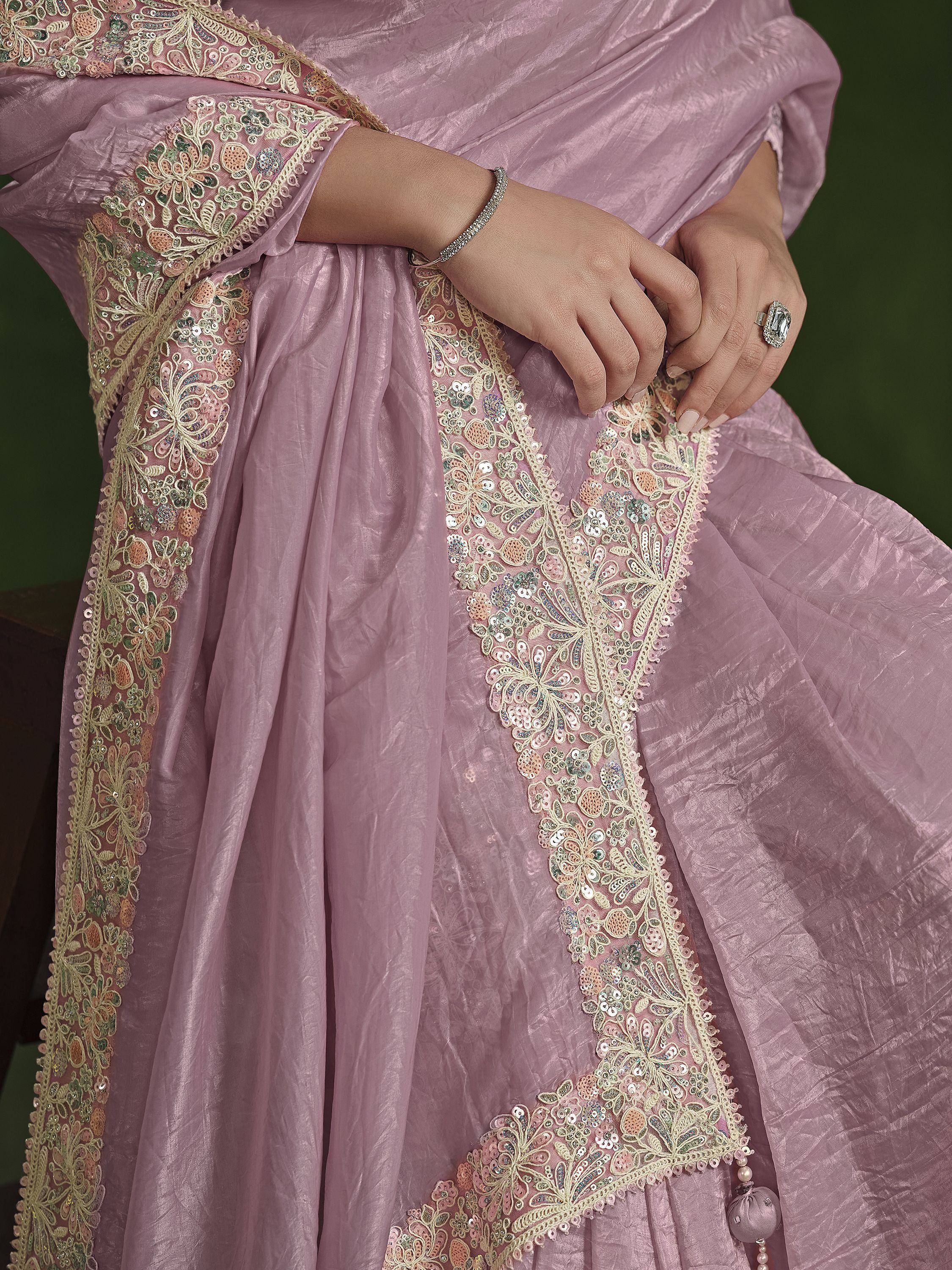 Pink ethnic gown with floral embroidery and sequins, perfect for Indian occasions