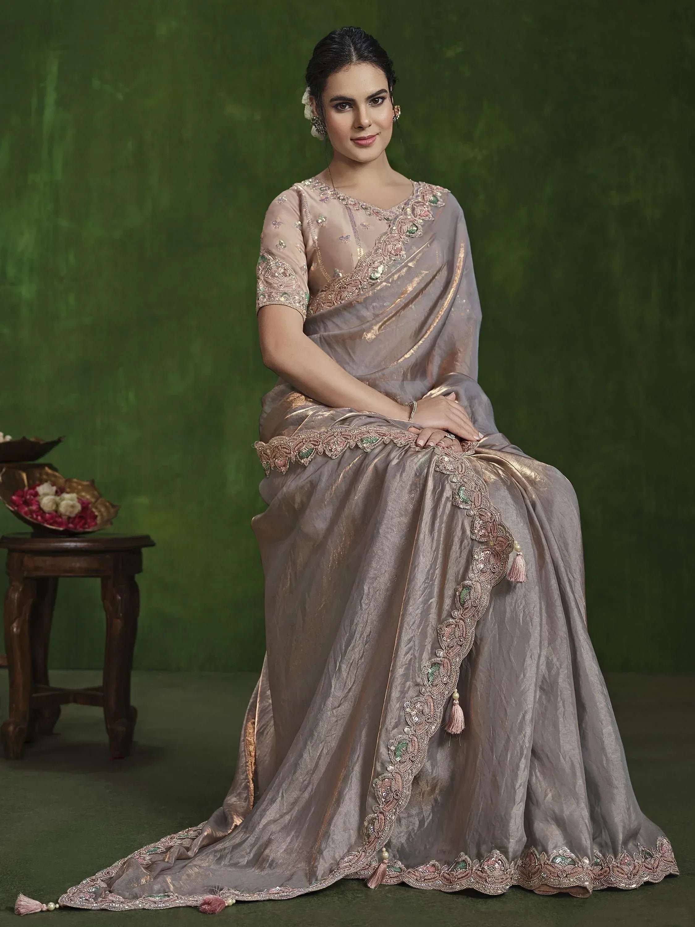 Elegant grey saree with pink and green embroidery, perfect for Indian ethnic occasions.