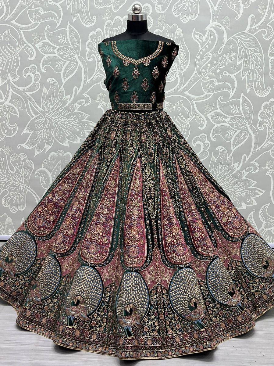 Emerald green designer lehenga with peacock embroidery and gold detailing, perfect for Indian ethnic wear.