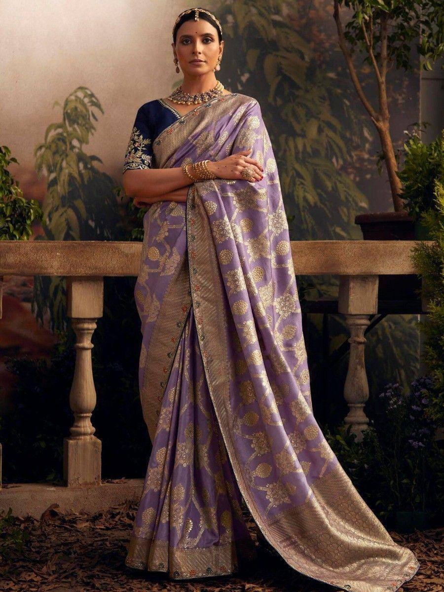 Lavender and gold designer saree with intricate floral motifs, perfect for ethnic occasions