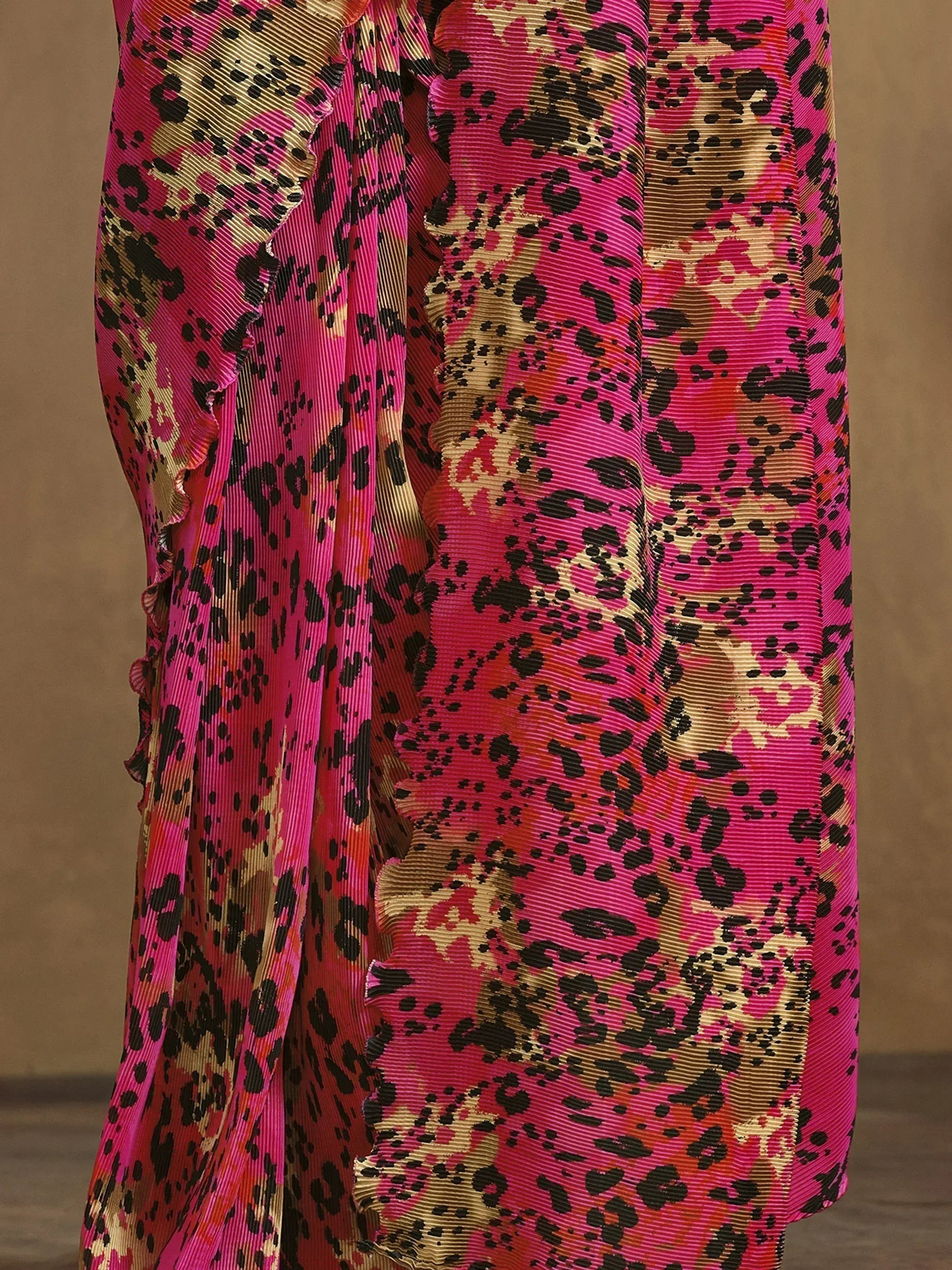 Vibrant pink and gold leopard print pleated ethnic gown with ruffled detailing