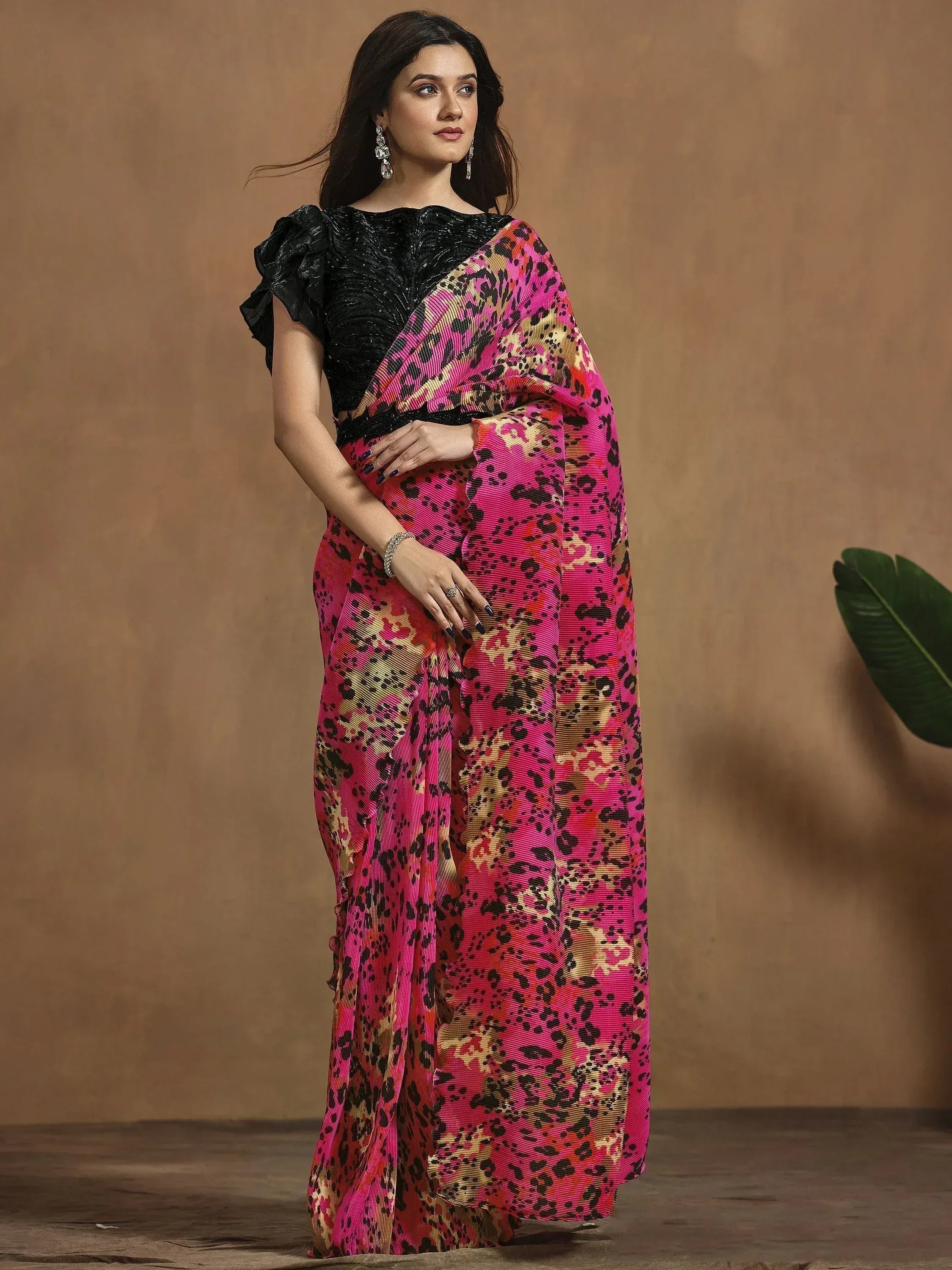 Pink leopard print saree with black sequin blouse, ethnic Indian wear