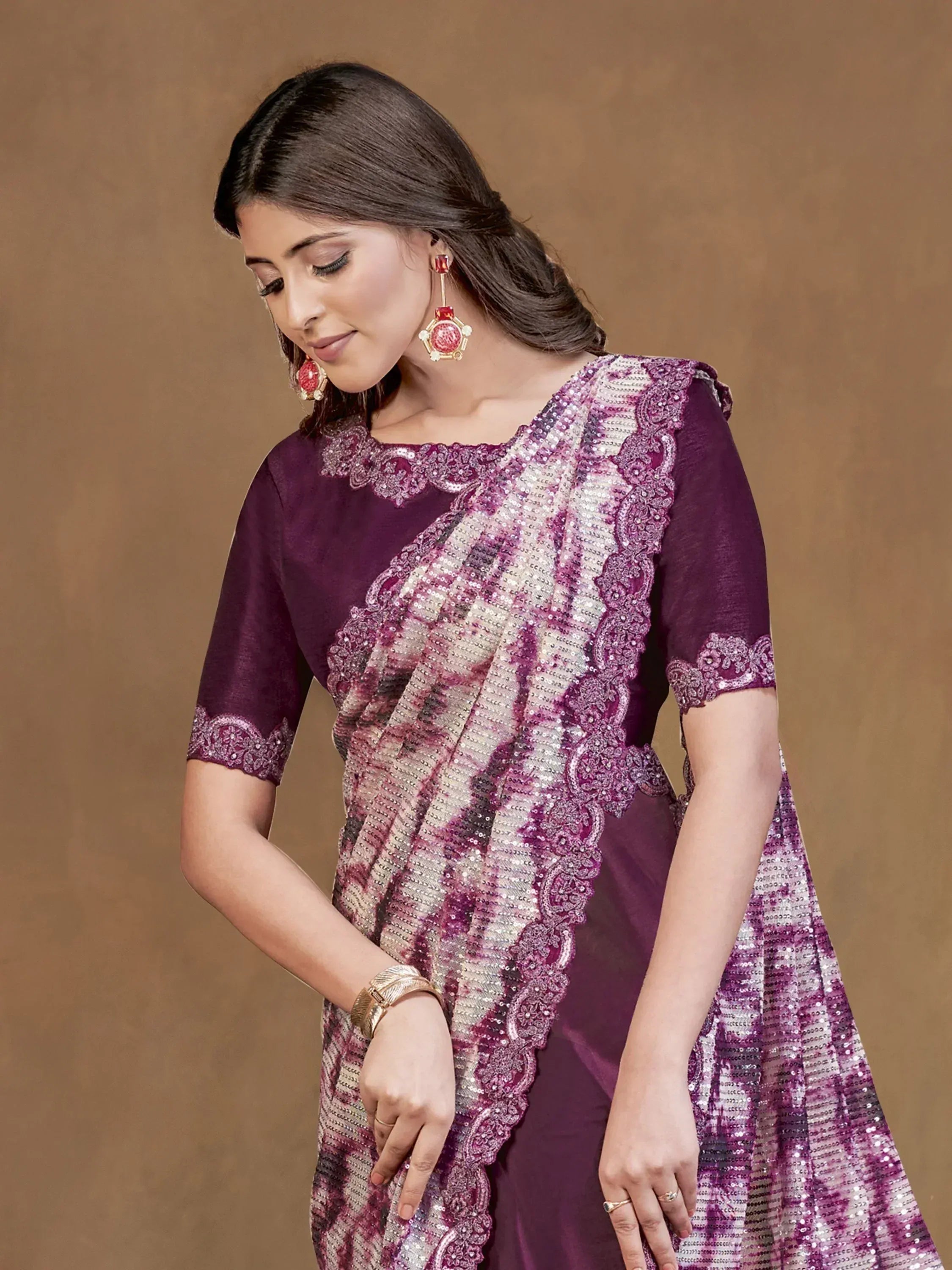 Purple ethnic gown with sequin and lace detailing, perfect for Indian festive occasions