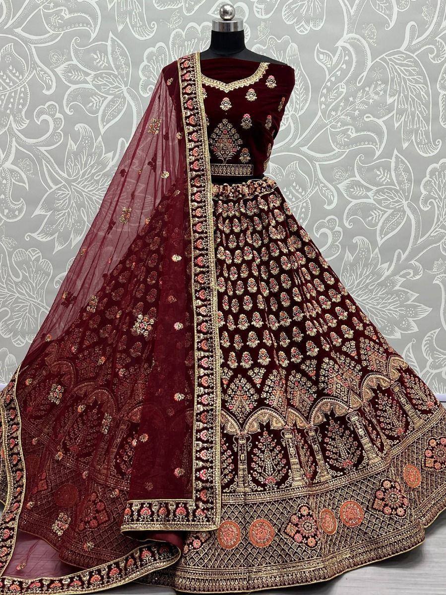 Maroon velvet lehenga choli with gold embroidery and net dupatta, Indian ethnic wear for weddings