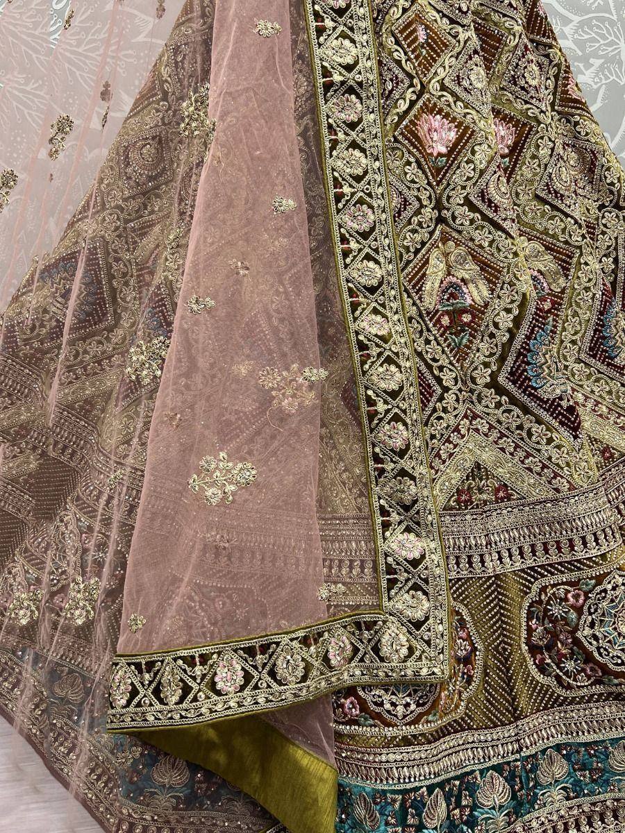 Luxury embroidered lehenga choli with floral motifs and sheer dupatta, perfect for Indian weddings and festive occasions.