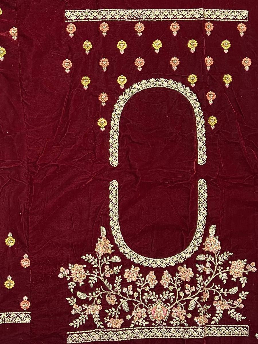 Maroon velvet ethnic blouse with floral embroidery and gold detailing, perfect for Indian wear