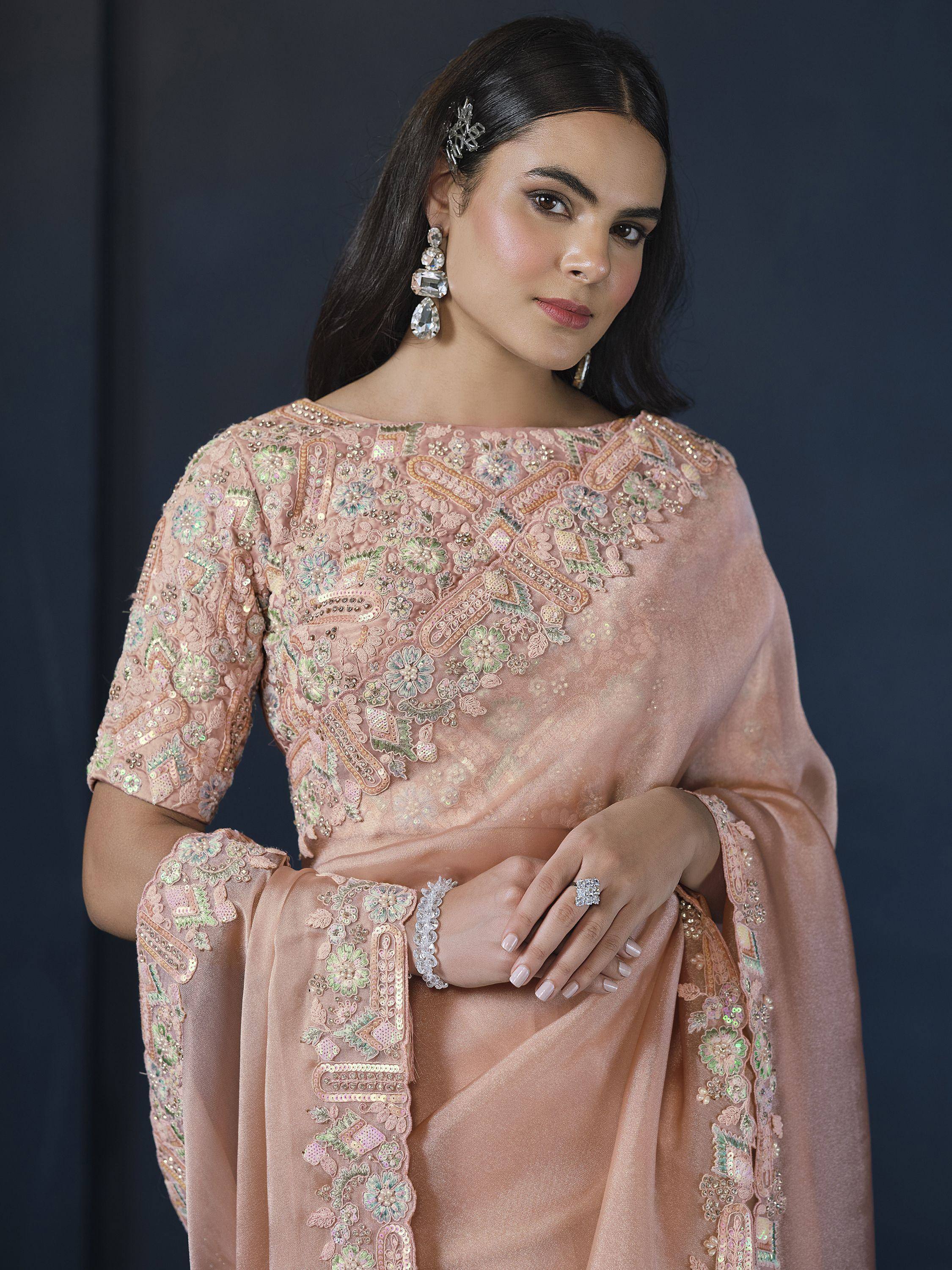 Elegant pink embroidered salwar kameez with floral sequin work, perfect for Indian ethnic occasions