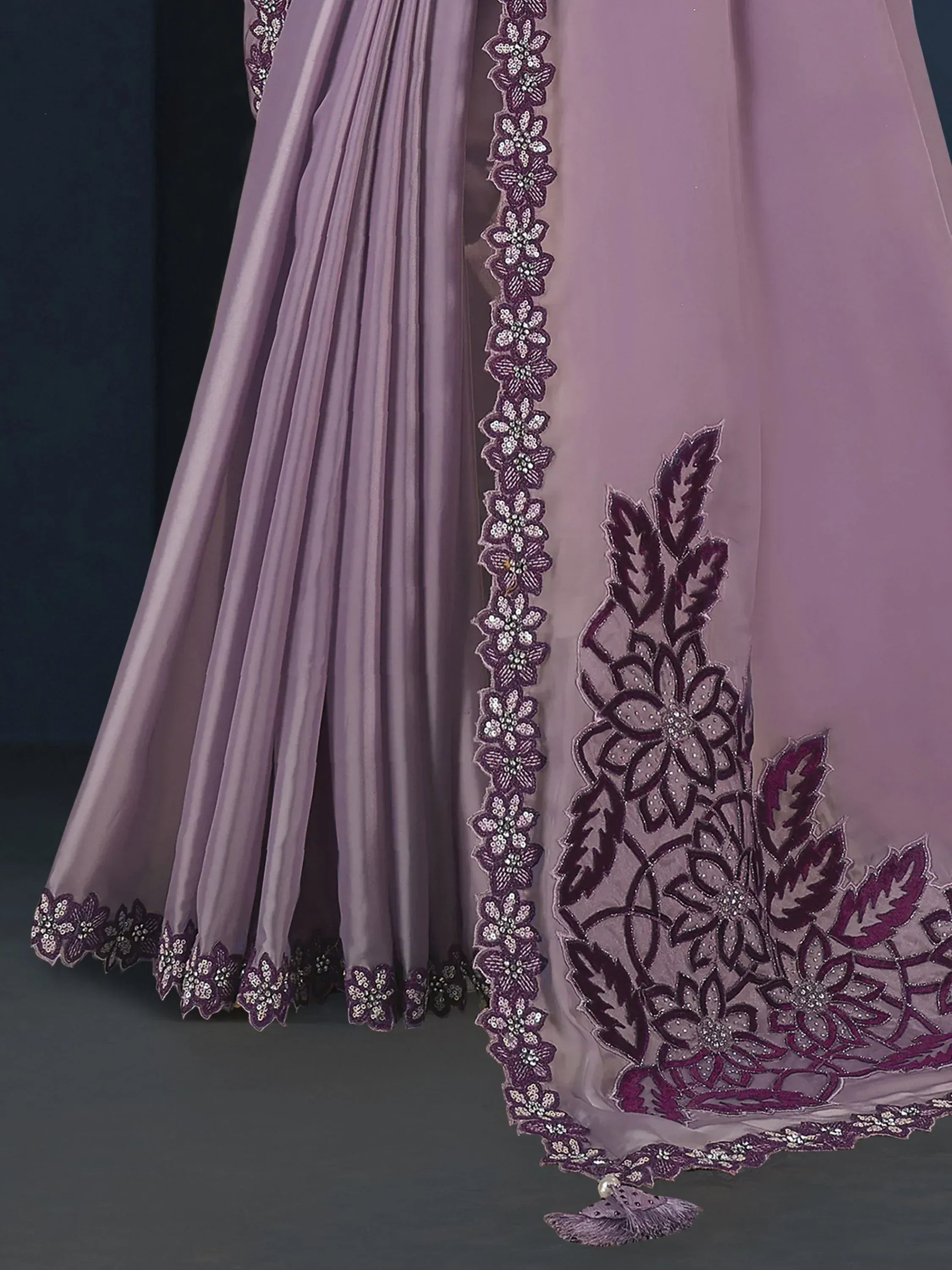 Lavender ethnic gown with floral embroidery and sequin detailing, perfect for Indian occasions