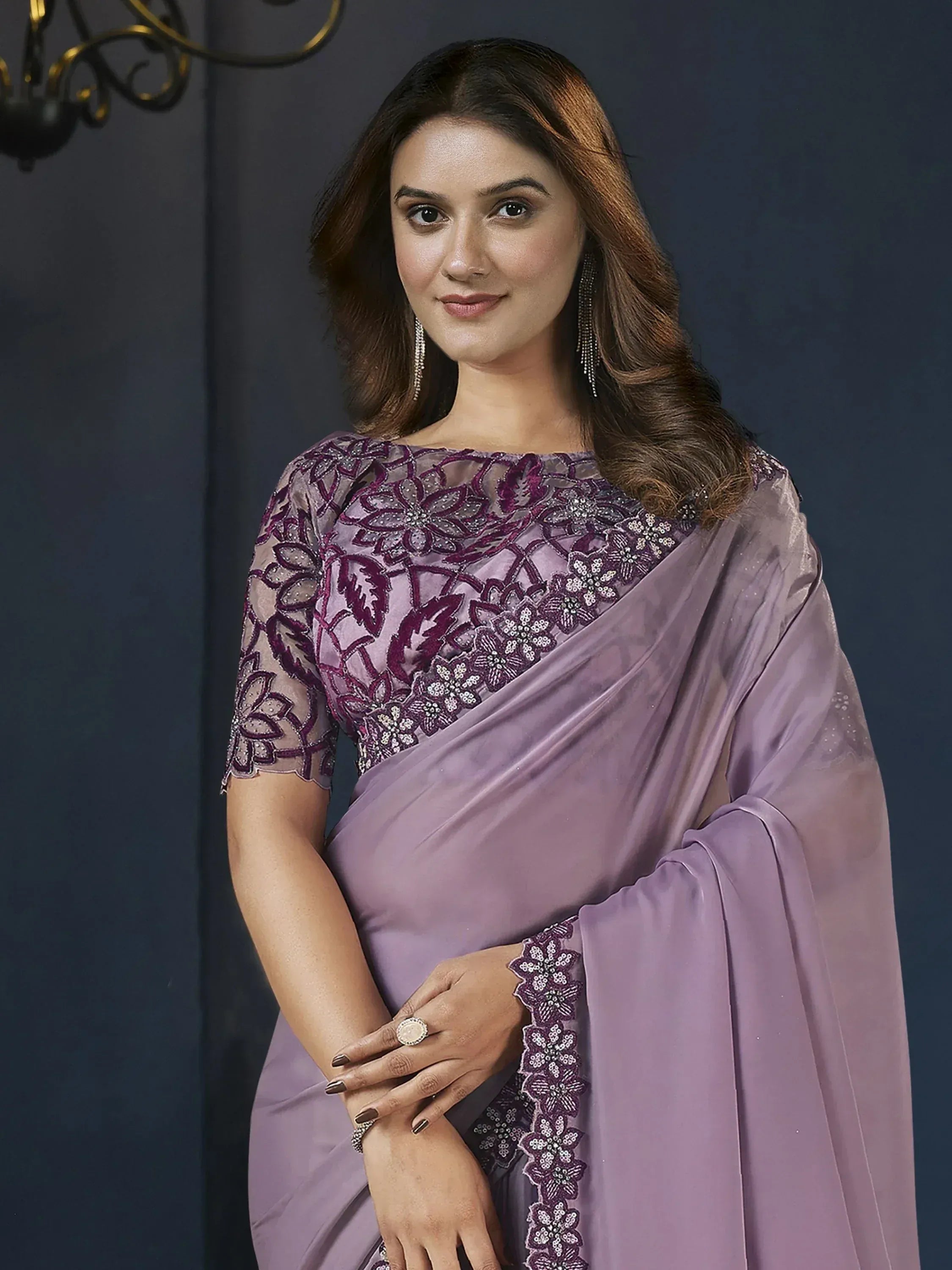 Elegant purple saree with floral embroidery and sequin work, perfect for Indian ethnic occasions