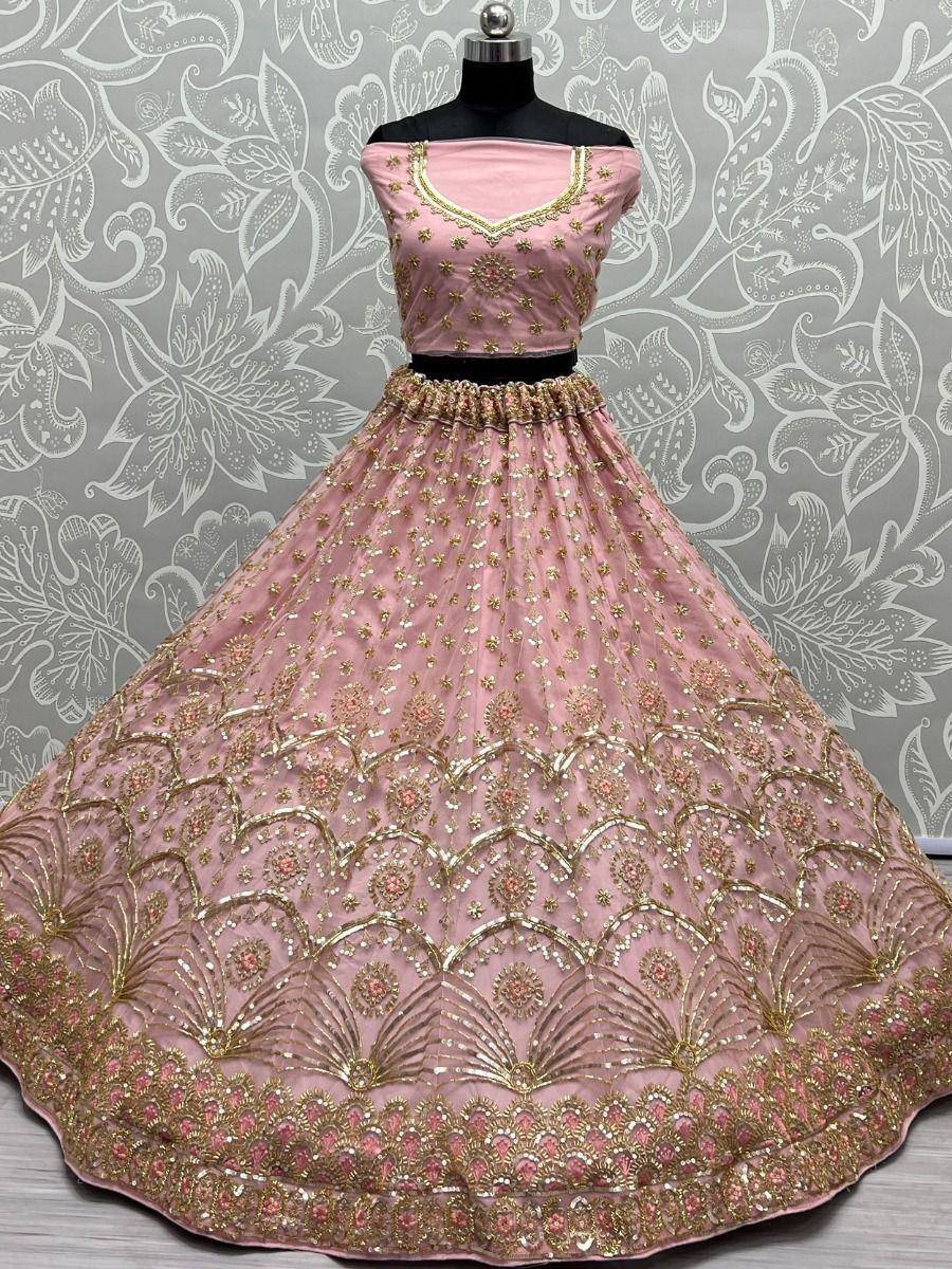 Pink designer lehenga choli with gold embroidery, perfect for Indian ethnic wear occasions
