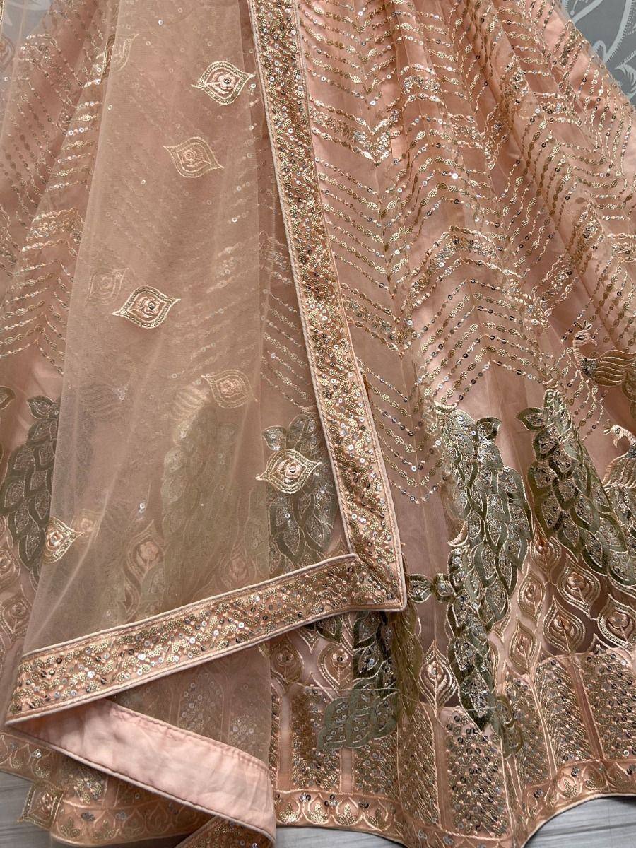 Pink designer lehenga with gold peacock embroidery and sequin detailing, ethnic wear for women