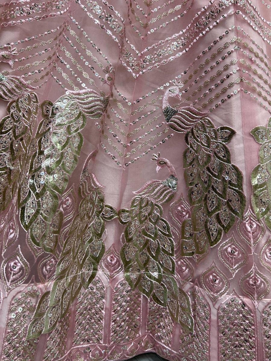 Pink ethnic wear fabric with peacock embroidery and sequin detailing for lehenga or saree