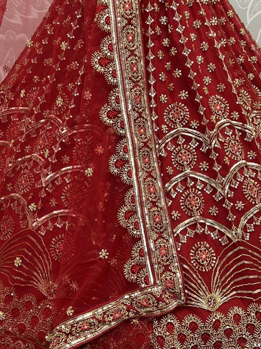 Red designer lehenga with gold embroidery and sequin work, ethnic Indian wedding wear