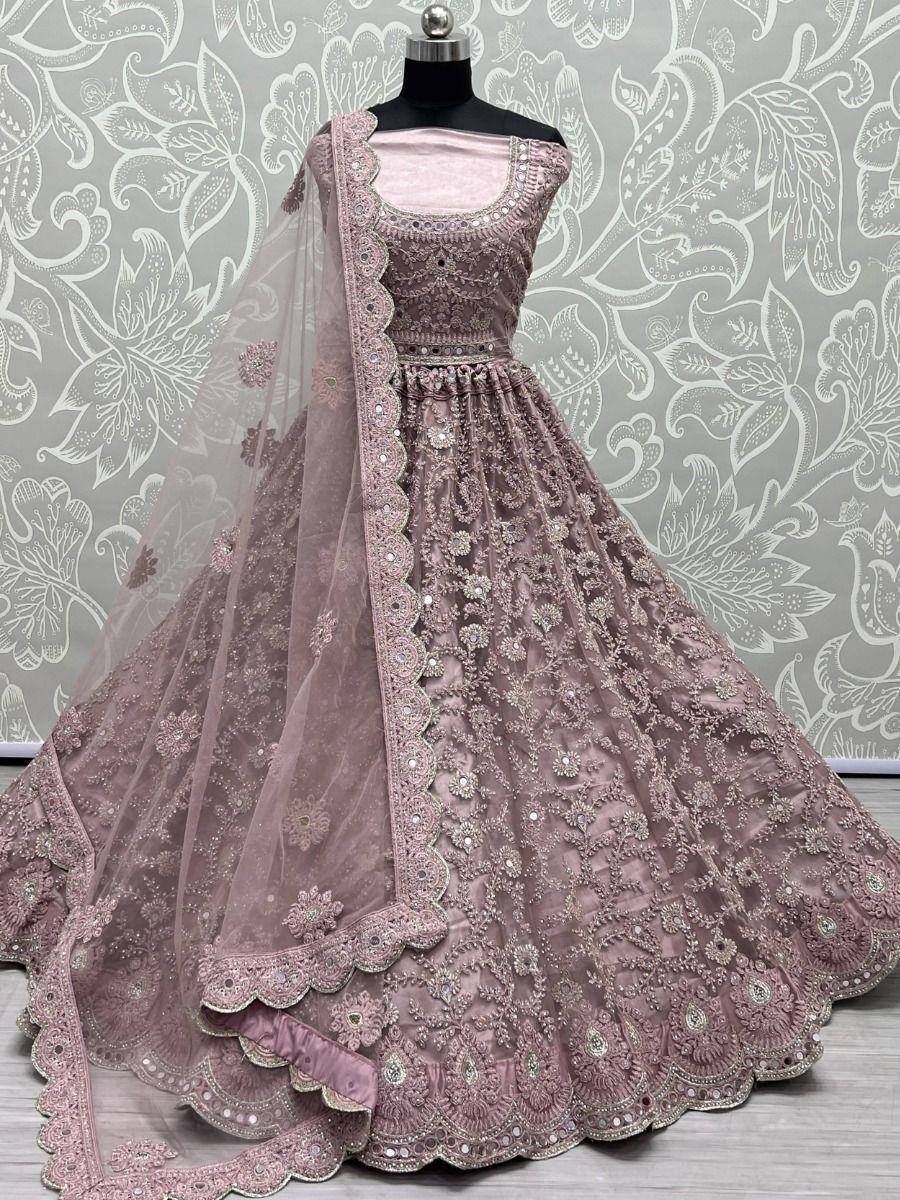 Pink embroidered lehenga choli with scalloped dupatta, perfect for weddings and festive occasions