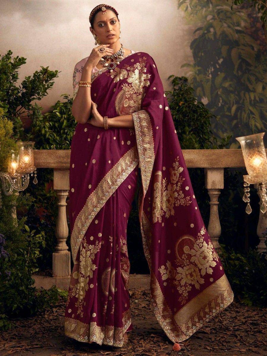 Elegant maroon saree with gold floral embroidery and border, perfect for Indian ethnic occasions