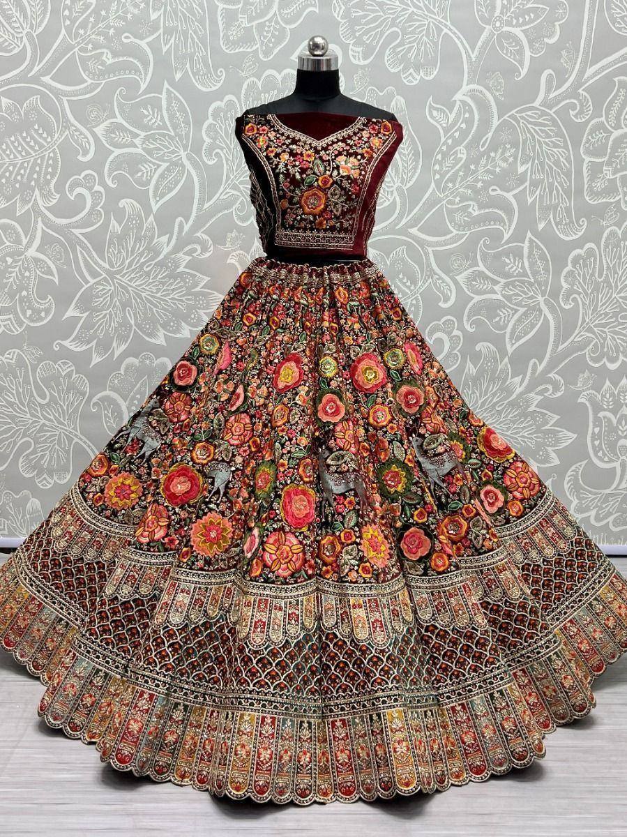 Designer floral lehenga choli with intricate embroidery and velvet blouse, perfect for Indian weddings and festive occasions.
