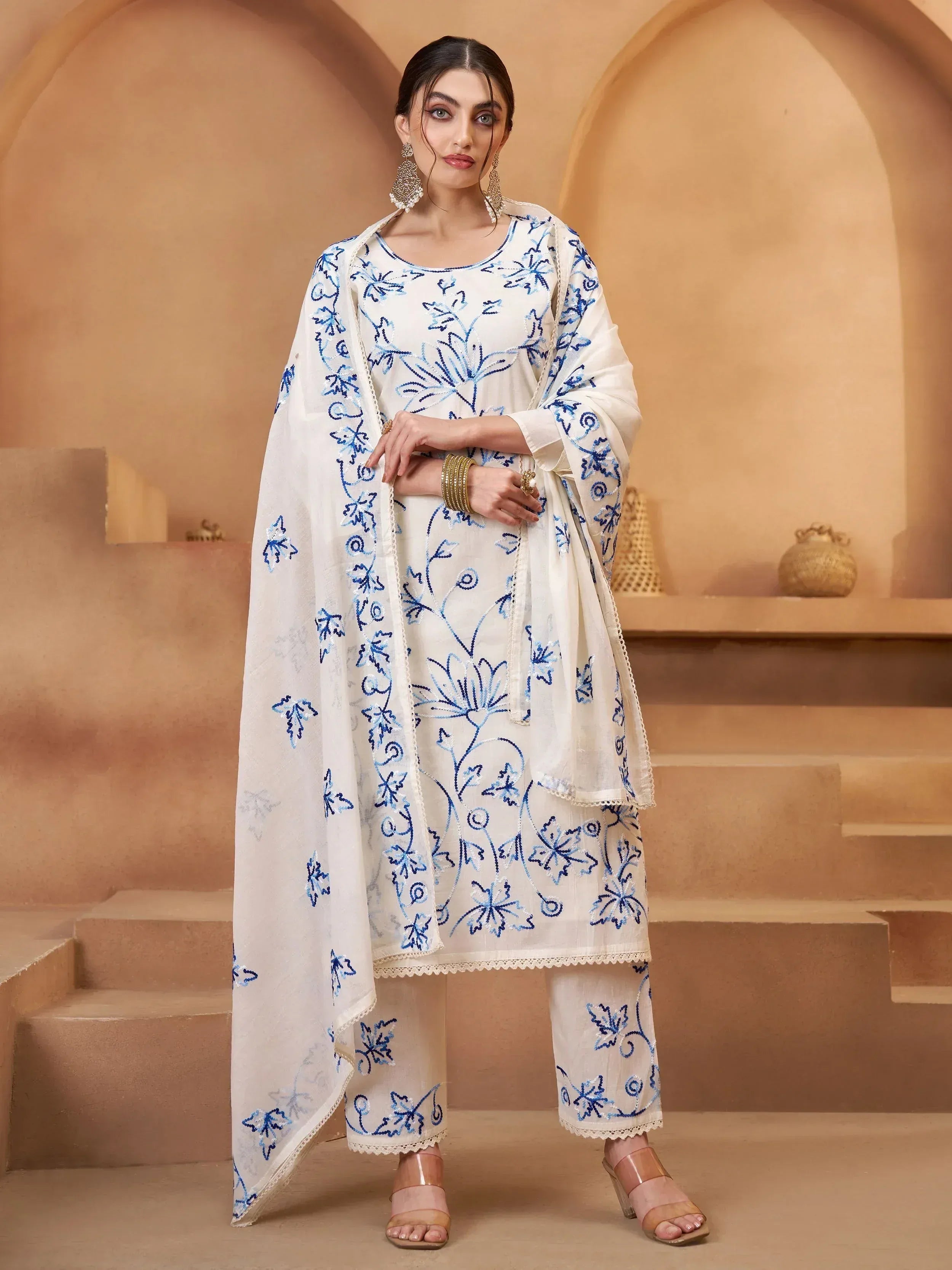 White salwar kameez with blue floral embroidery, ethnic wear for women