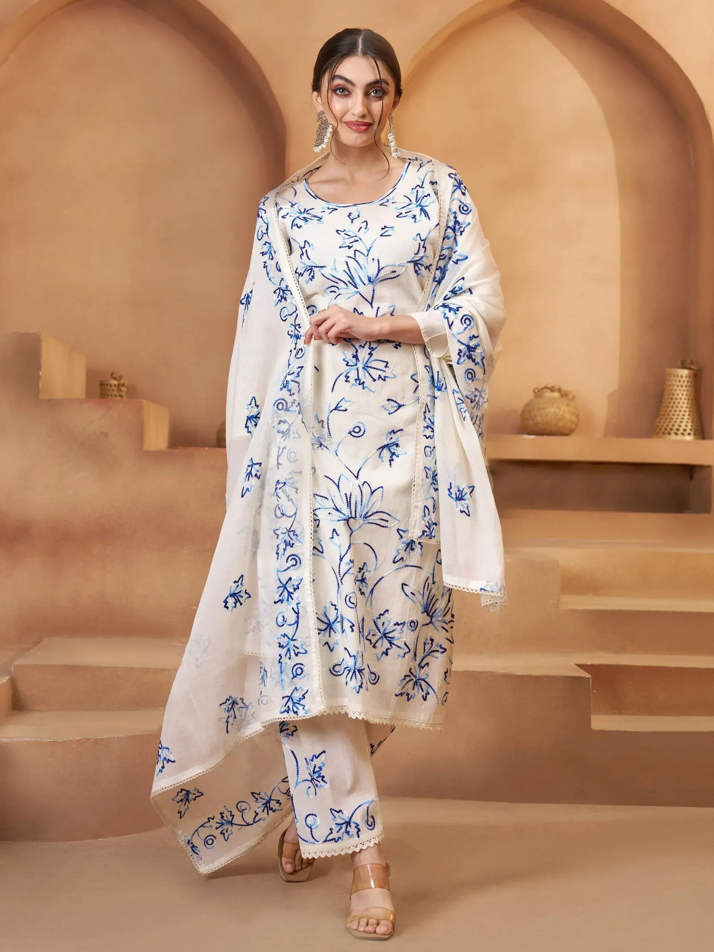 White salwar kameez with blue floral embroidery, ethnic wear for women