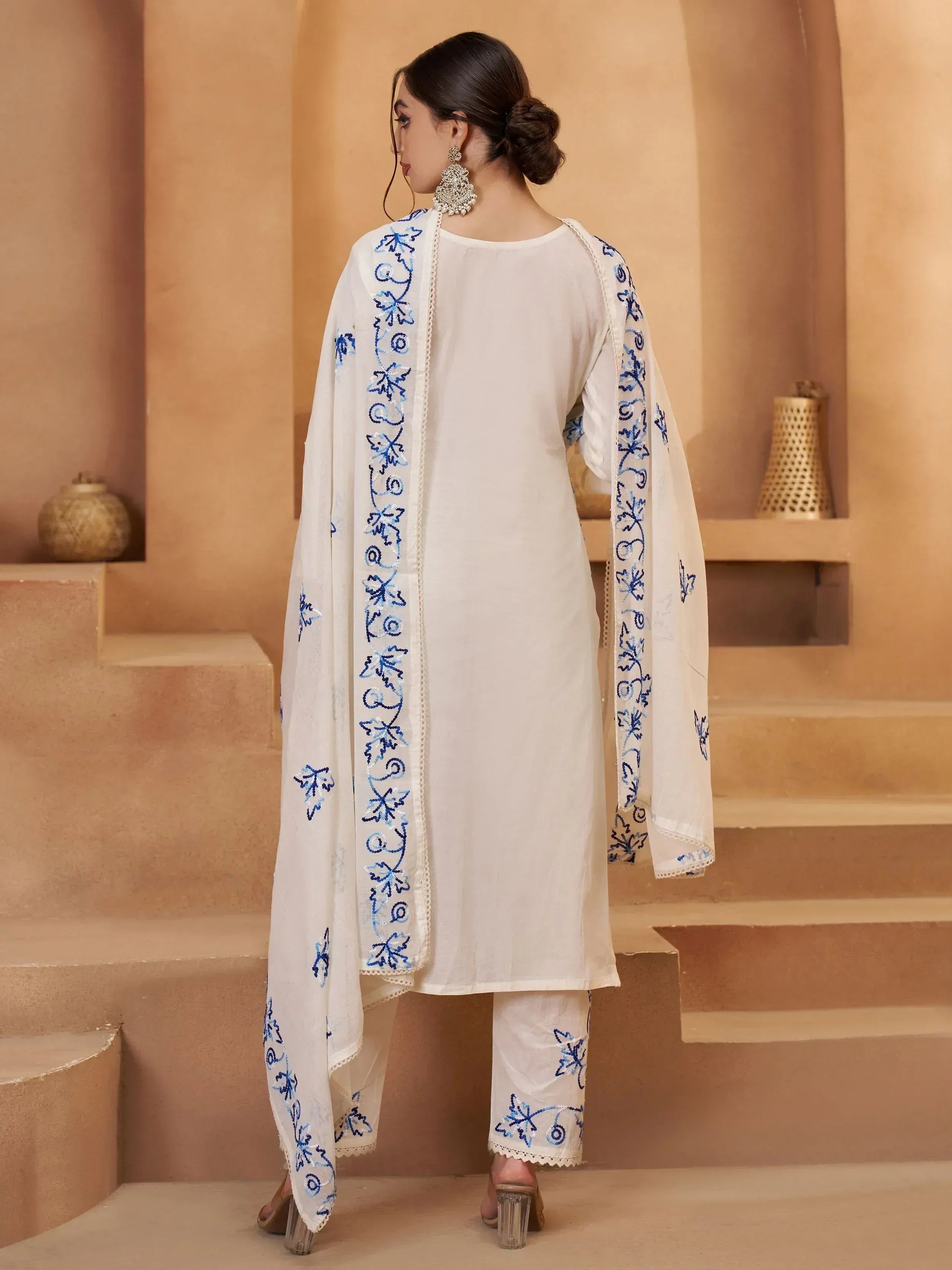 White embroidered salwar kameez with blue floral dupatta, ethnic Indian wear for women