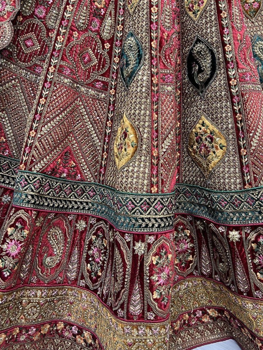 Spectacular Red Heavy Embroidered Velvet Bridal Lehenga Choli