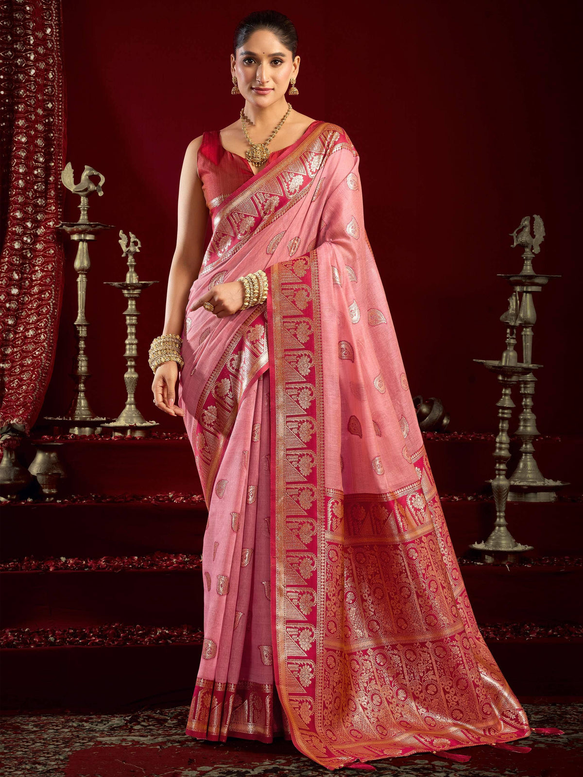 Pink and red designer saree with gold zari work, perfect for Indian ethnic occasions