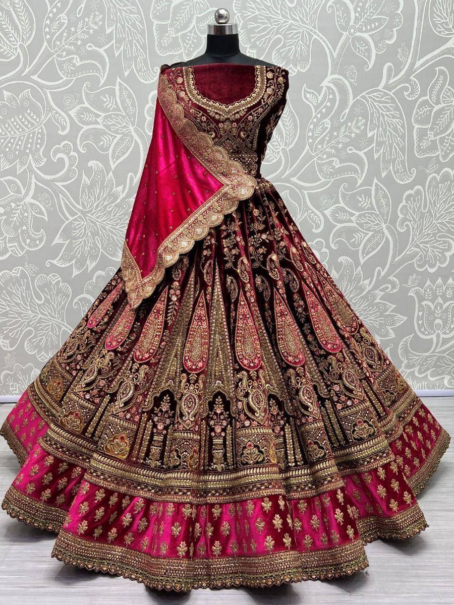 Maroon velvet lehenga choli with gold embroidery, perfect for Indian weddings and festive occasions