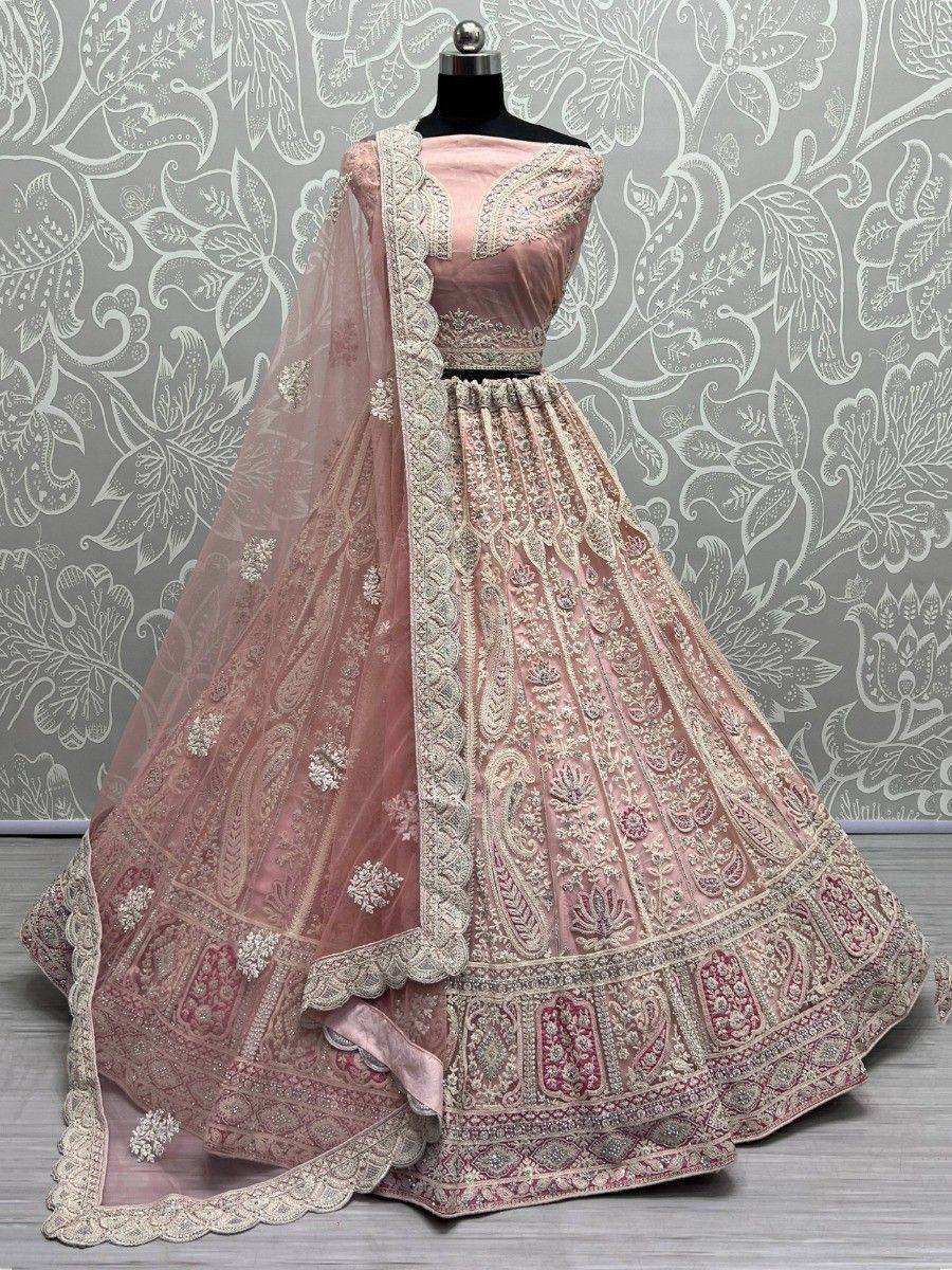 Pink designer lehenga choli with intricate embroidery and matching dupatta for Indian ethnic wear